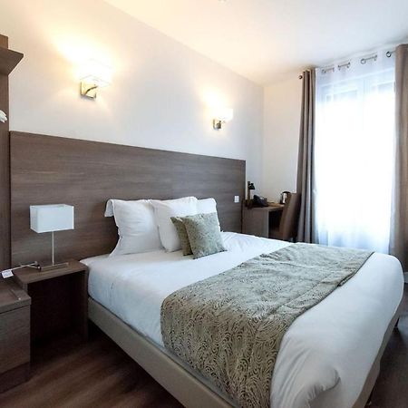 Le Theatre Hotel Suresnes Bagian luar foto