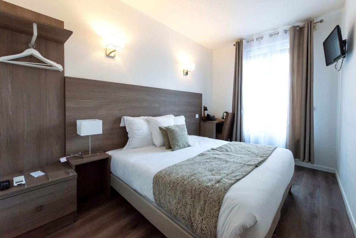 Le Theatre Hotel Suresnes Bagian luar foto
